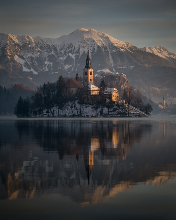In the back you can see Bled's castle and the parish church. Bled is located in the north west of Slovenia, close to the Austrian border.