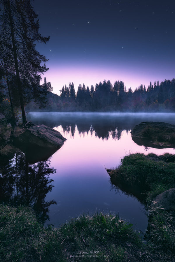 After I walked through a beautiful and enchanted forest, I finally reached the lake „Cresta-See“. It really was still dark and everything was quiet and beautiful. And every now and then a cracking noise from left or right … noises, which approached me like floating sounds from the darkness. I could see nothing, but there was an atmosphere like those found only in storybooks. And suddenly this lake appeared out of the darkness. The first light of the morning fought their way through the darkness and revealed this beautiful spectacle of a steaming lake. I’ve visited this lake many times in the past, and I never ever was disappointed by the magic of this place. I hope you like it. Thank you for your time and interest in my photos, your visit is most appreciated :-) _________________________ All my photos are copyrighted, © 2015 Manuel Martin (All rights reserved) - please don't download or print any of them without my permission and don't use my images on websites, blogs, facebook or other media without asking me. My posts are also on Facebook | 500px | Blog | Twitter | Google+ | Prints and Downloads are available at my Homepage _________________________