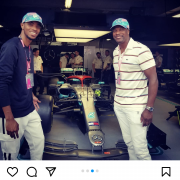 Destin and Chris Tucker in front of Mercedes pit