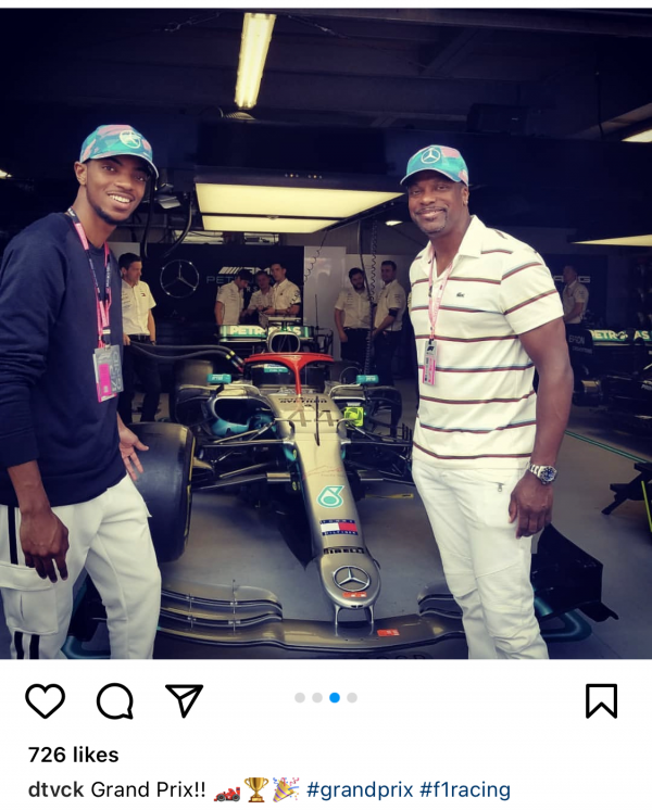 Destin and Chris Tucker in front of Mercedes pit