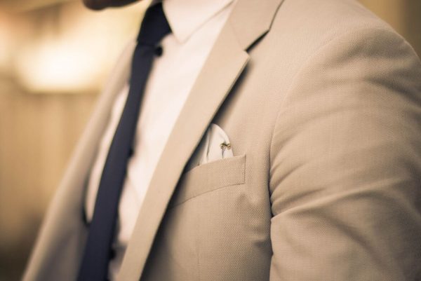 man in brown suit