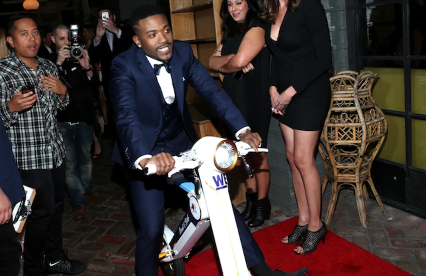 Ray J with a Raytroniks Scooter