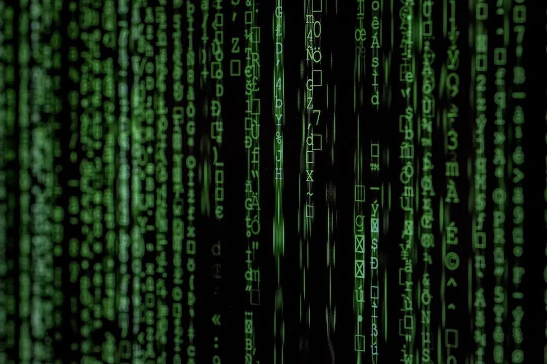 Data streams down a screen in green.